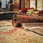 A pile of rugs sitting on top of a floor